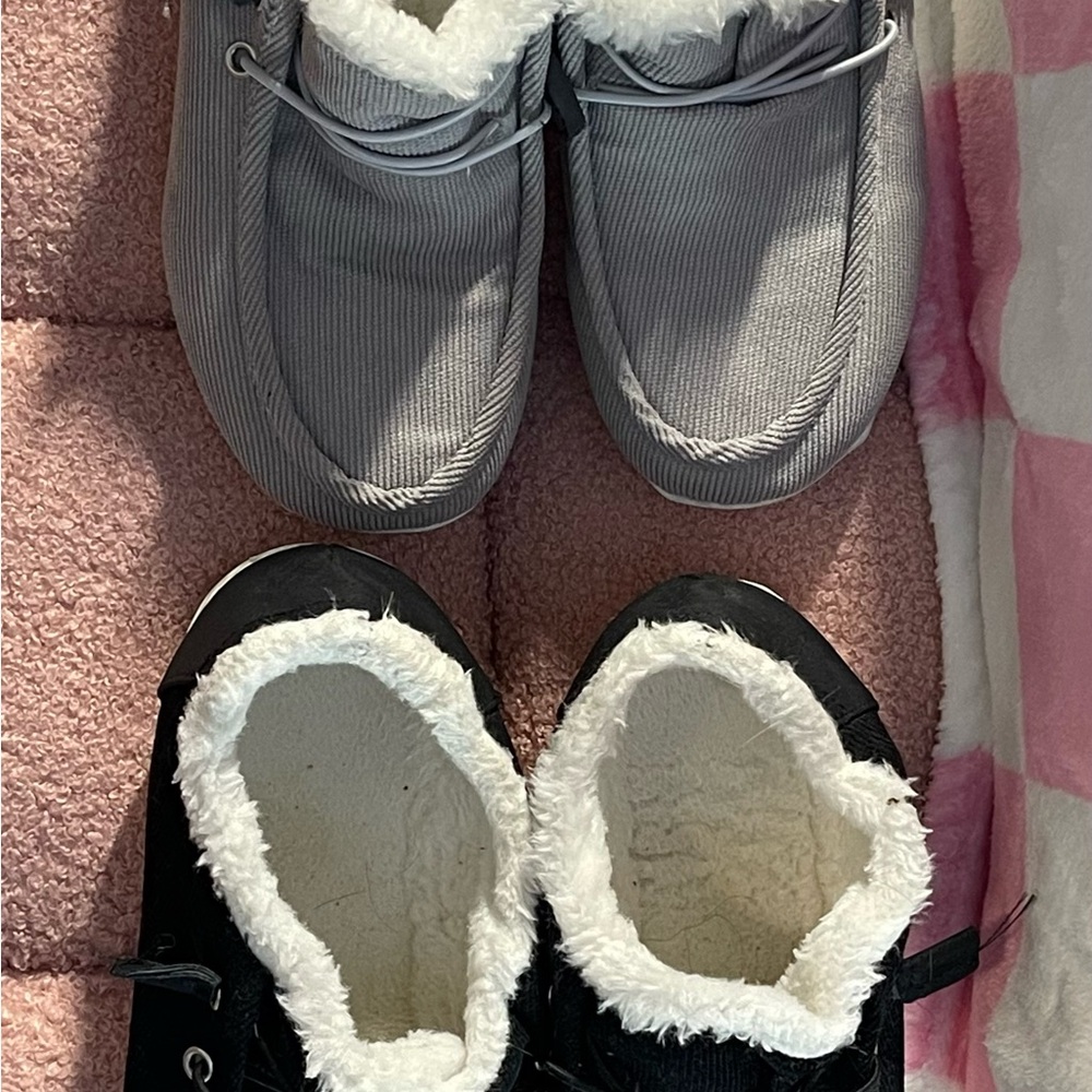Gray and black slippers in good condition. Have only been worn in the house.